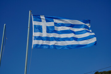 greek flag waving in the air