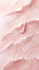 Close-up of smooth pastel pink texture in vertical composition