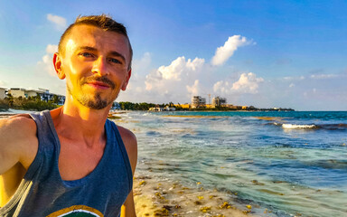 Male tourist Travelling man taking selfie Playa del Carmen Mexico.