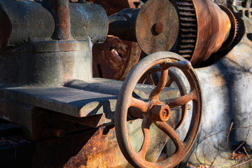 old rusted stone lathe at an abandoned stone quarry in NH