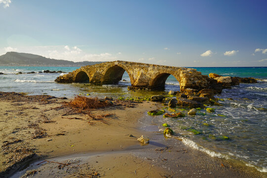 ancient stone bridge in Argassi beach in Zakinthos , Greece