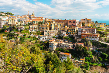 Panoramic view of the city of Vietri sul Mare. Residential buildings and a church. The Amalfi coast of Italy