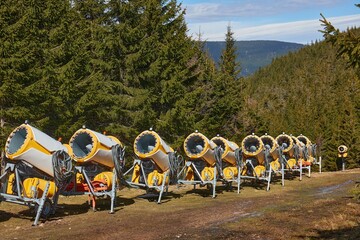 Snow making machines stored in the mountains