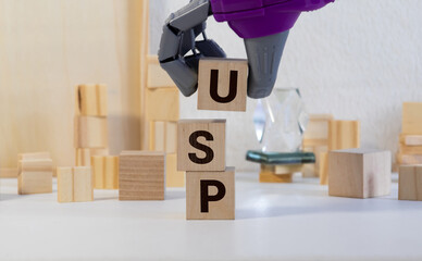 wooden blocks on a gray background with the text USP