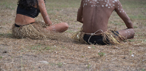 Young adult Indigenous Australians couple on ceremonial dance in Laura Quinkan Dance Festival Cape...