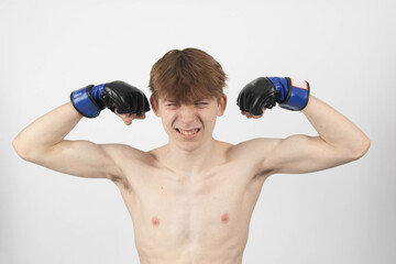 A Shirtless Teenage Boxer Boy