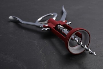 One wing corkscrew on grey textured table, closeup