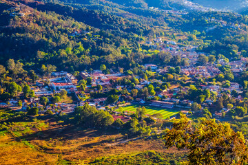 Village among the mountains seen from the heights, sunrise in the valley of Bravo state of Mexico