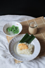 Asian Thai dessert, Sticky rice with durian in coconut milk and Lod Chong on table. 
