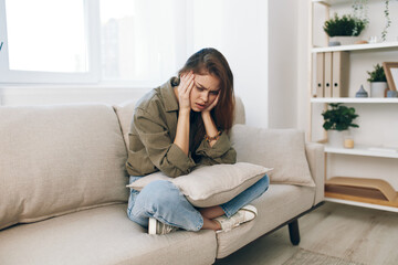 Lonely Woman on Couch, Feeling Sad and Worried: Mental Health Depression Home