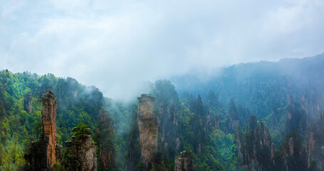 panoranic view of zhangjiajie national forest park Hunan, China. view of the mountain covered with mist after the rain.
