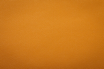 Synthetic leather brown background texture. Brown leather textured background.