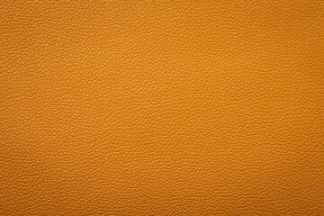 Synthetic leather brown background texture. Brown leather textured background.