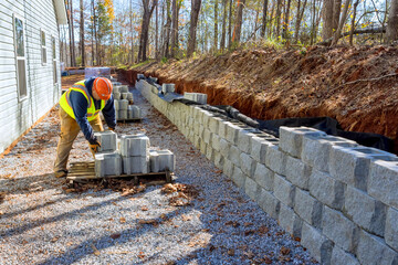 Installation of concrete block retaining walls was performed by contractor