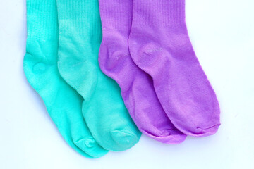 Colorful socks on white background.