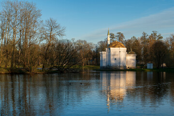 The pavilion of the Turkish Bath on the shore of a Large pond in the Catherine Park in Tsarskoye Selo on a sunny spring day, Pushkin, St. Petersburg, Russia