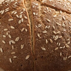 Fototapeta premium loaf of bread on wooden table