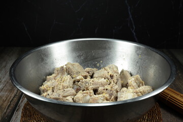 Pile of marinated pork rib with garlic and special sauce. Famous raw food concept. Preparation food...