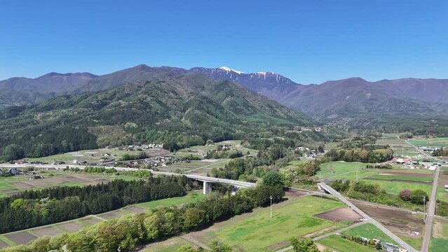 長野県伊那市、中央道小黒川PA付近からドローンで木曽山脈を撮影。
