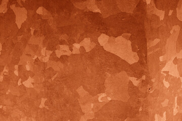 orange background with texture and distressed vintage grunge and watercolor paint stains 