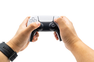 Console gamepad new generation on male hand in isolated background. Controller console playing...