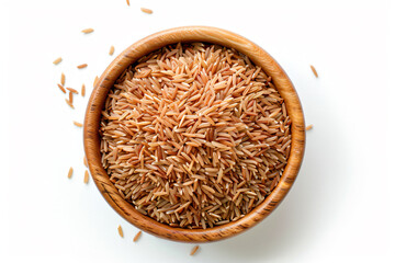 a wooden bowl filled with brown rice on top of a white table