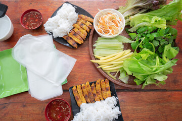 Close up photo of fresh ingredients for Nem Nuong, Baked rolls, signature dish of Nha Trang, Vietnam