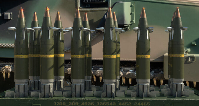 Guided 155 mm artillery ammunition on a howitzer battle position