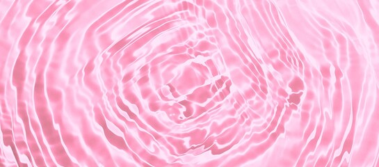 Abstract pink water ripple surface. Transparent clear water shadow on pink background. Sunlight...
