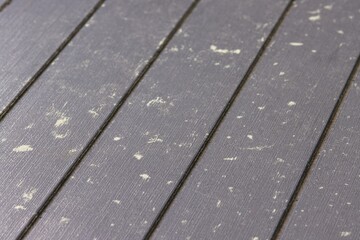 Pine pollen on the surface of rattan furniture, allergen and allergic reaction to tree dust.