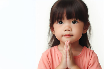 child praying isolated on white background