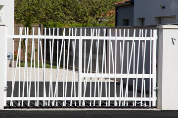 sliding gate modern metal white home facade on suburb house