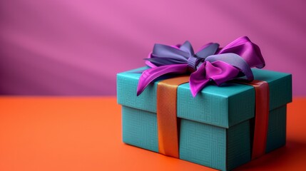 Obraz premium Bright green colored cardboard box with purple bow and ribbons placed