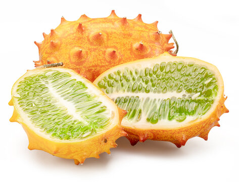 Kiwano fruit with kiwano slices isolated on white background.