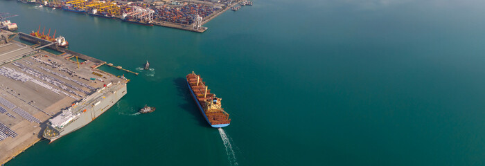 front view Cargo Container ship the ocean ship carrying container and running for import export...