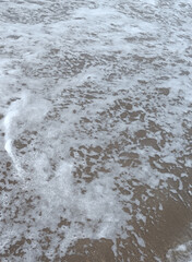 footprints on the beach. Nature tropical sea