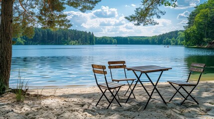 Fototapeta premium A beach scene with a table and chairs set up near the water