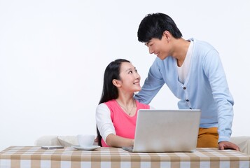 Take young lovers using laptops