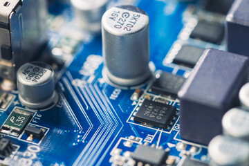 The technician is putting the CPU on the socket of the computer motherboard.