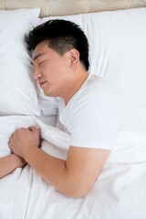 Husband and wife lying on the bed