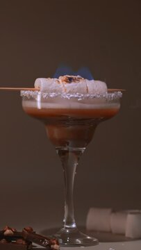 Burning s'mores cocktail with marshmallow