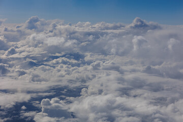 Fototapeta premium Aerial Airplane High nature view white clouds blue sky sunny day, View of white clouds on the plane Banner, Background