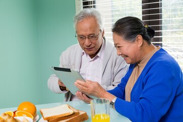 Elderly couples have breakfast in the restaurant