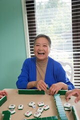 The family playing mahjong