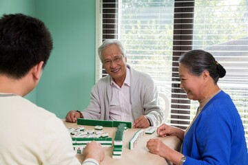 The family playing mahjong
