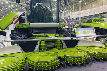 Modern agricultural combine at the exhibition pavilion