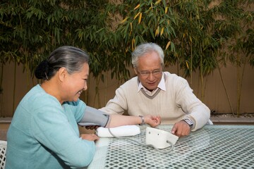 The elderly couple's blood pressure in the yard