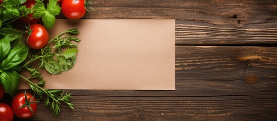 Wooden background with a composition of fresh herbs tomatoes and a sheet of paper creating a copy space image - Powered by Adobe
