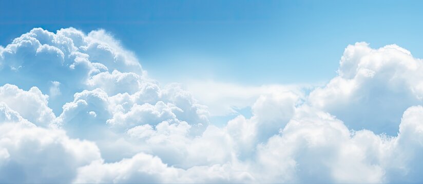 A stunning copy space image of pastel blue skies with isolated beautiful clouds