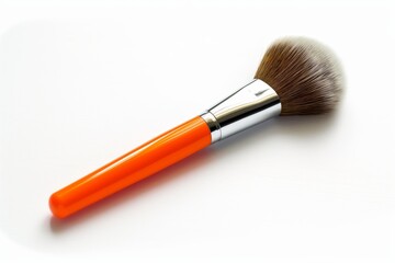 High-angle view of an elegant makeup brush with orange handle isolated on a white surface, symbolizing beauty tools
